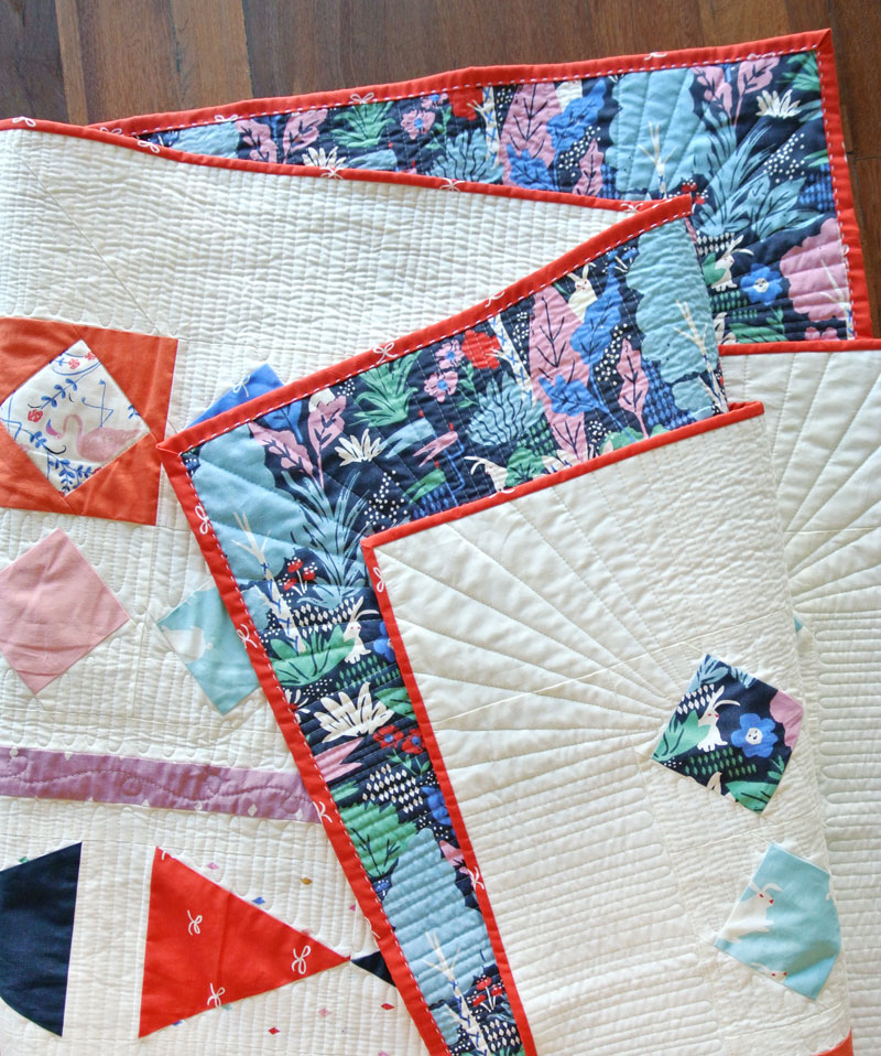 Get this free quilt pattern inspired by the Adventures of Alice in Wonderland! A modern quilt pattern created through piecing rows. suzyquilts.com