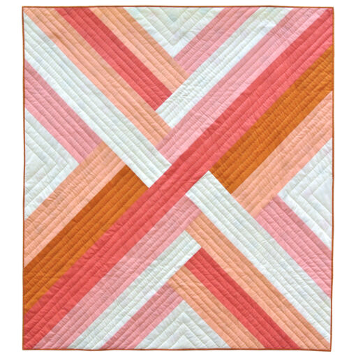 The Maypole Quilt Pattern is a simple, clean design with lots of bold impact. The look of this quilt changes radically based on fabric choice.