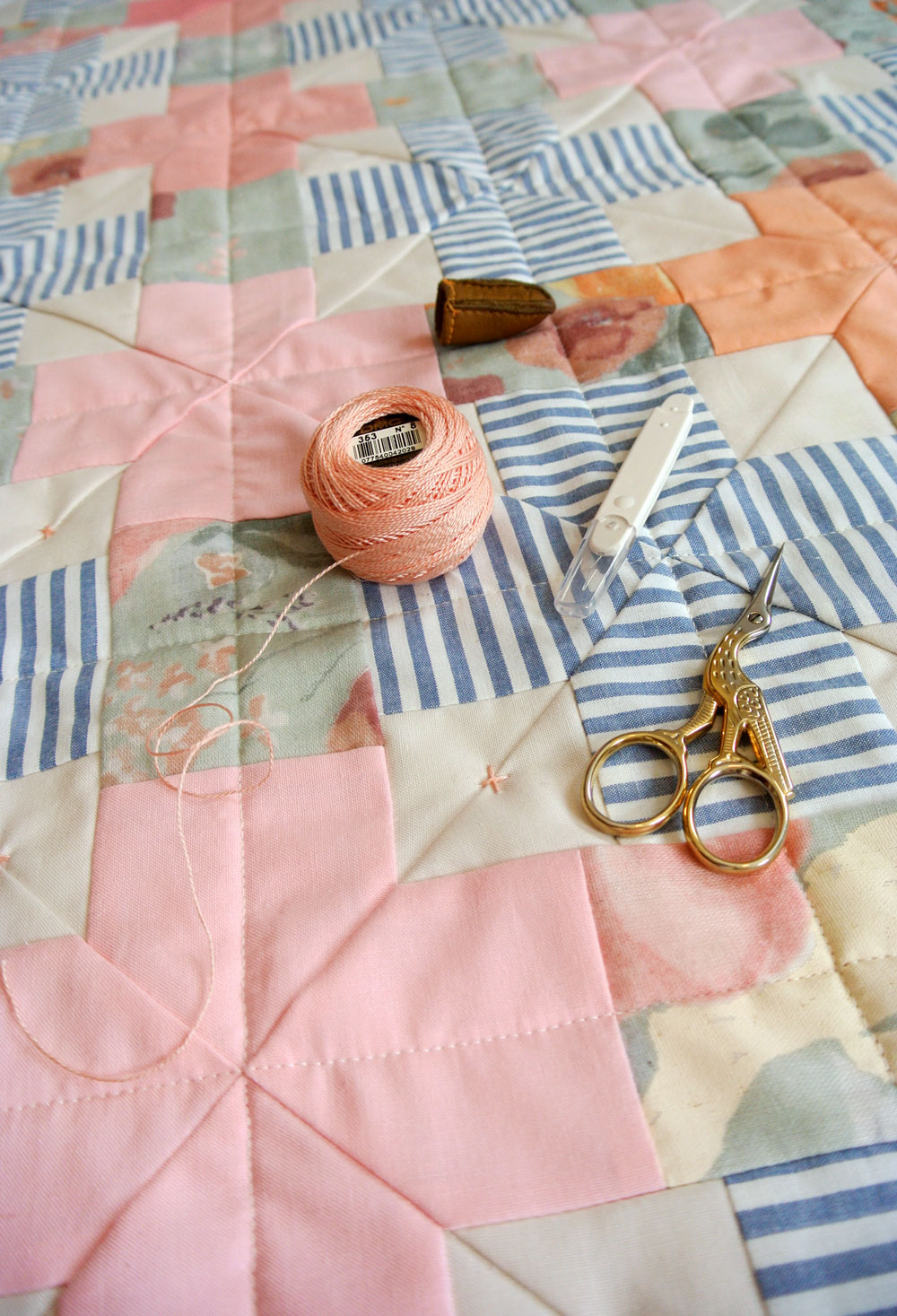 How to tie a quilt with a modern twist! | Suzy Quilts https://suzyquilts.com/how-to-tie-a-quilt-with-a-modern-twist