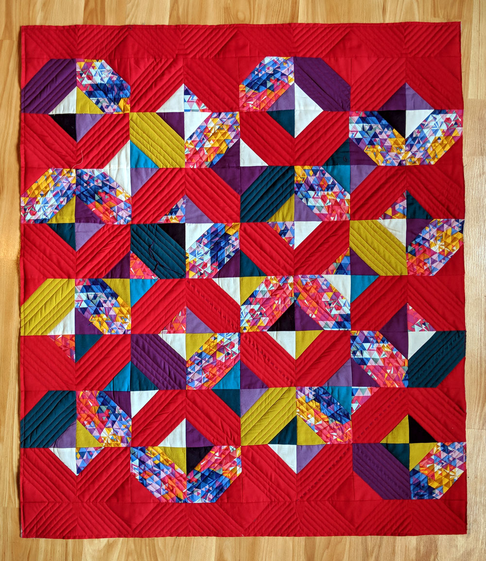 The Glitter and Glow quilt pattern is beginner friendly and also works well with fat quarters and scraps!