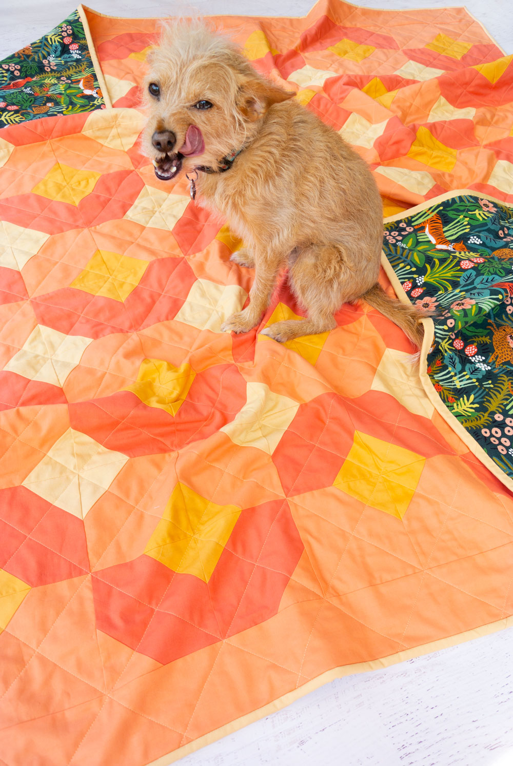 The Glitter and Glow quilt pattern is fun and versatile. Use yardage, fat quarters, or scraps you have in your stash! This peachy mango glow kit is backed with Rifle Paper Co. canvas and uses jersey rather than batting to create the perfect outdoor quilt.