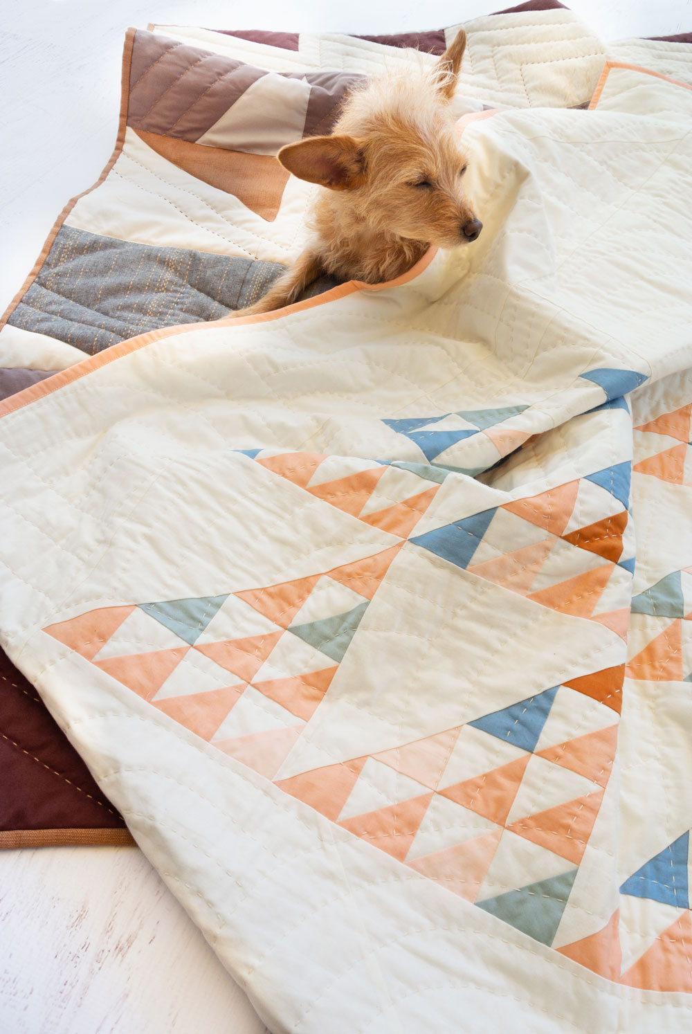 Beginner Quilting Questions are answered in the multi-part blog series! Are you ever confused about what batting to use? Find out the difference between cotton and wool batting!