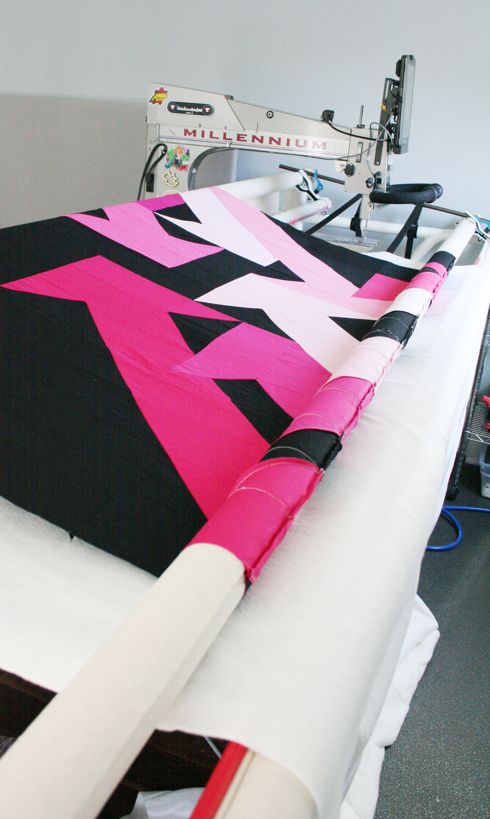 Do you have questions about hiring a longarm quilter? This in-depth guide answers all of those questions from fabric to price to turnaround time.