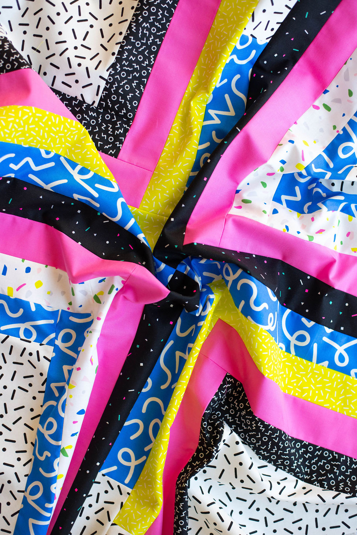 The Sugar POP quilt pattern is a PDF download that includes throw, baby and a pillow size. This modern design works well as a gradient or with fabric scraps.