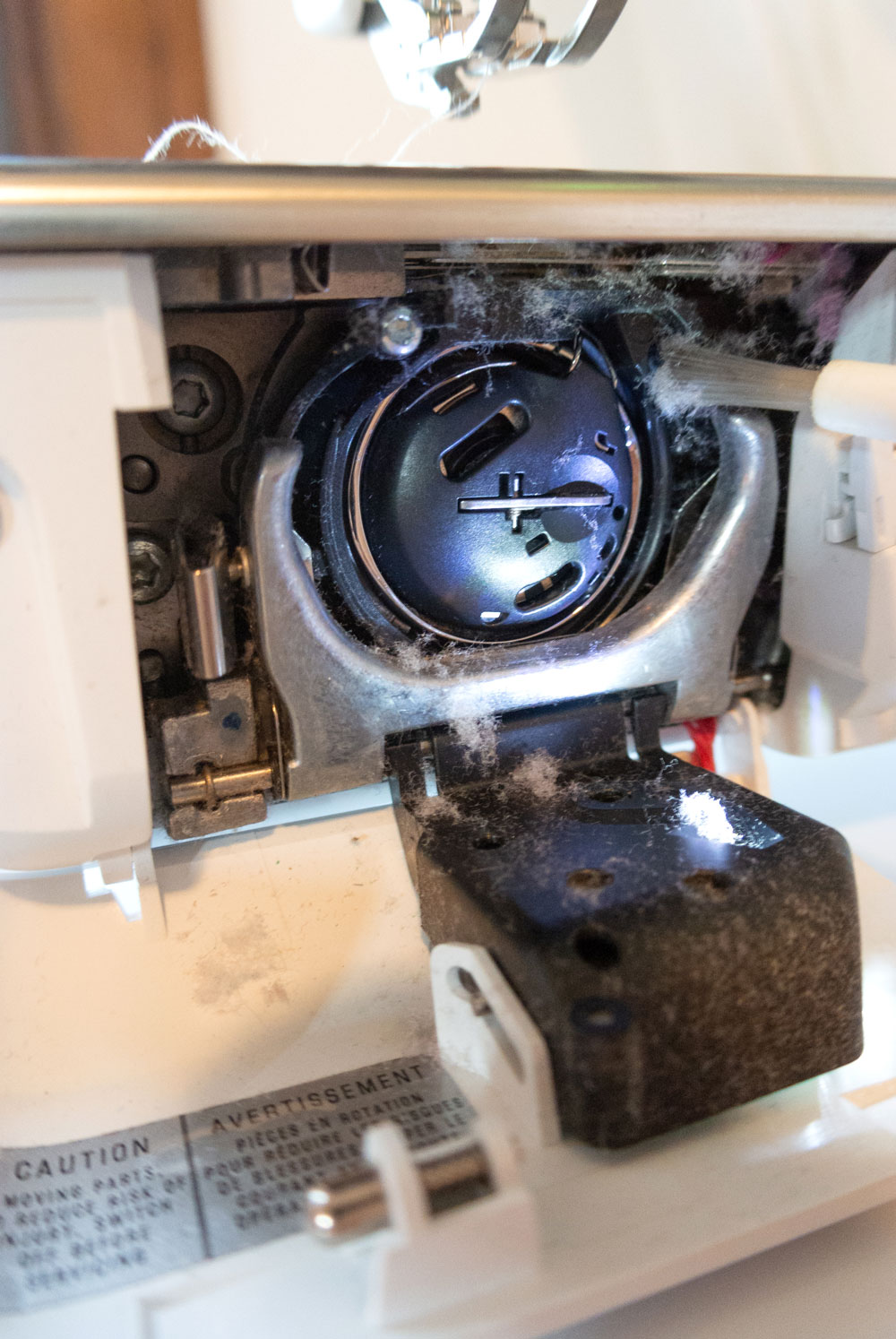 A step by step tutorial on how to clean your sewing machine – you should be doing it more than you think!