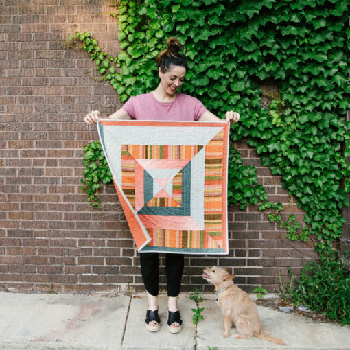 The Reflections Wall Hanging and Pillow extension pattern is a beginner-friendly modern design. These two projects are perfect for a fat quarter bundle or using up scraps!