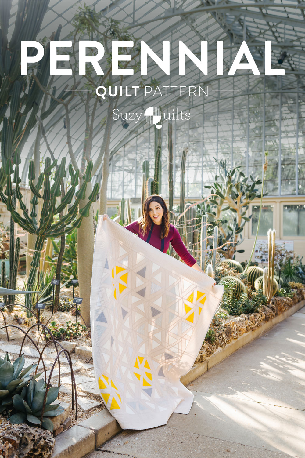 A Beautiful modern flower quilt pattern to add some cute pom poms! The Perennial quilt pattern looks like wildflowers growing in a meadow – so use your scraps! Fat quarter and fat eighth friendly plus video tutorials! suzyquilts.com #ModernQuilt