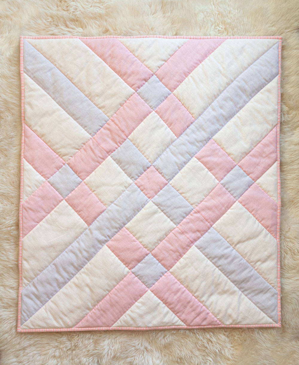 How to make the softest baby quilt in the world! The answer is to quilt with double gauze and wool batting – a sewing tutorial on how to do both! suzyquilts.com #babyquiltpattern #nurseryinspo