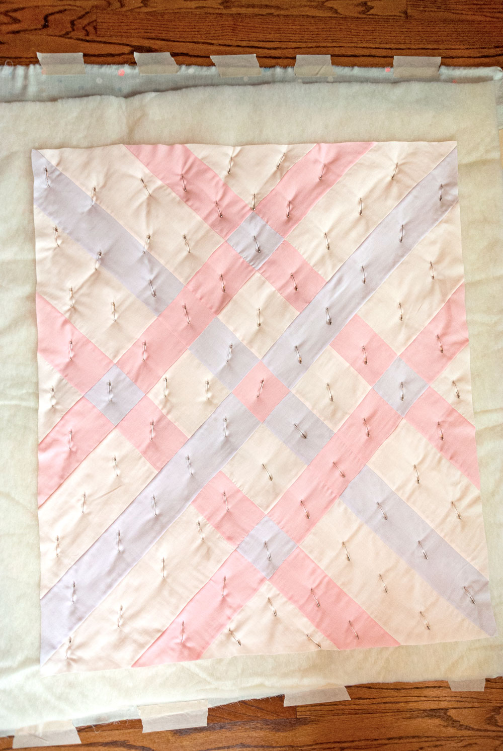 How to make the softest baby quilt in the world! The answer is to quilt with double gauze and wool batting – a sewing tutorial on how to do both! suzyquilts.com #babyquiltpattern #nurseryinspo
