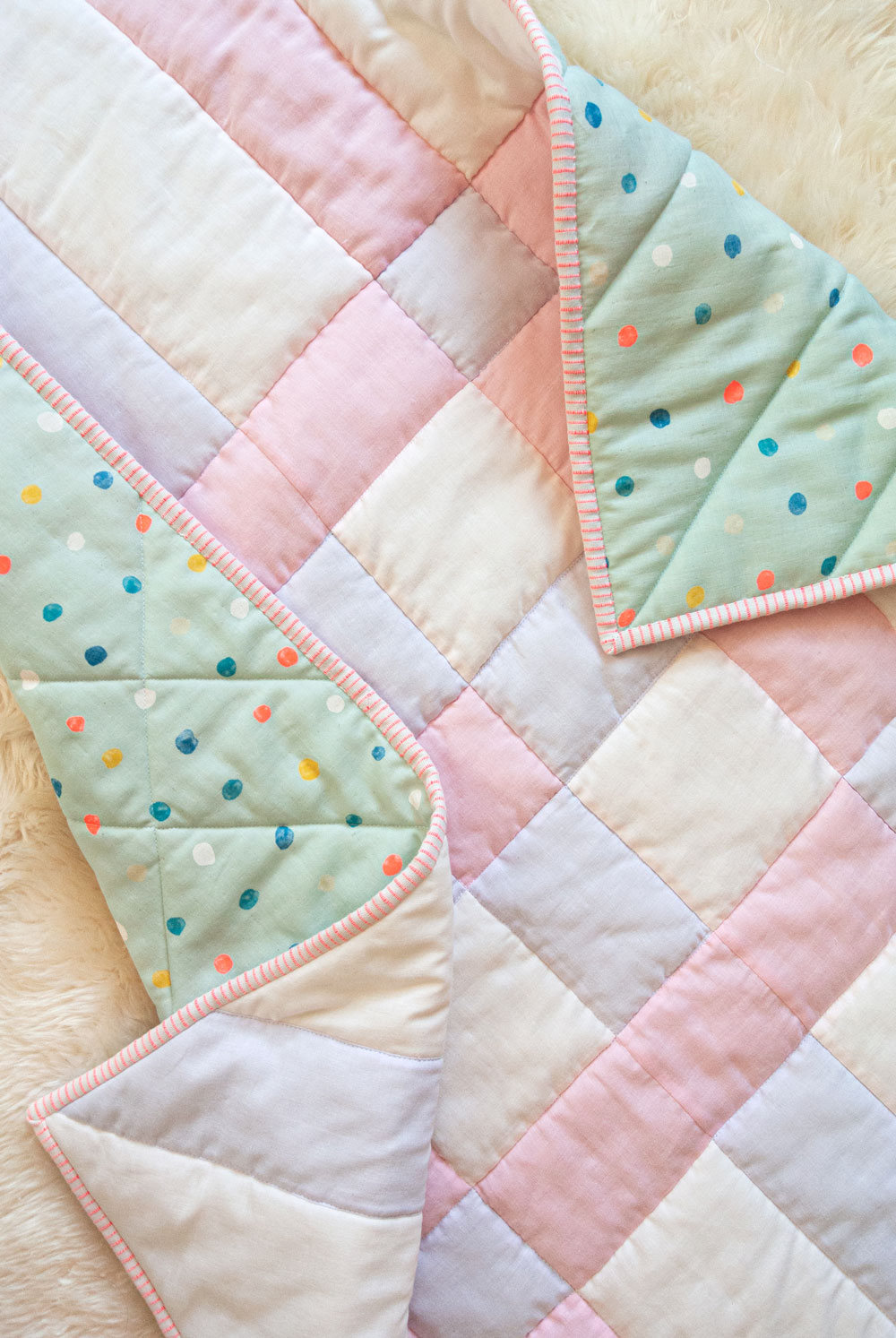 Why wool batting makes the warmest quilts! Learn how to quilt with this beautifully fluffy and sustainable fiber. suzyquilts.com #babyquilt #quilttutorial