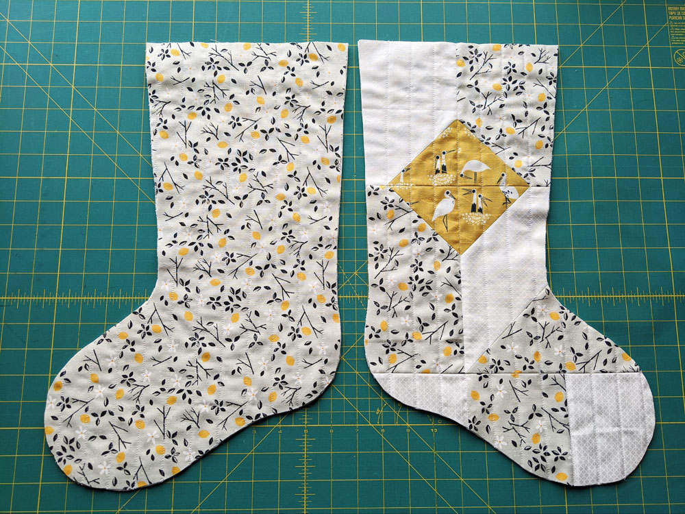A free quilted Christmas stocking pattern right in time for the holidays! Sew a simple, modern stocking with this step by step tutorial. suzyquilts.com #DIYstocking #quiltedstocking