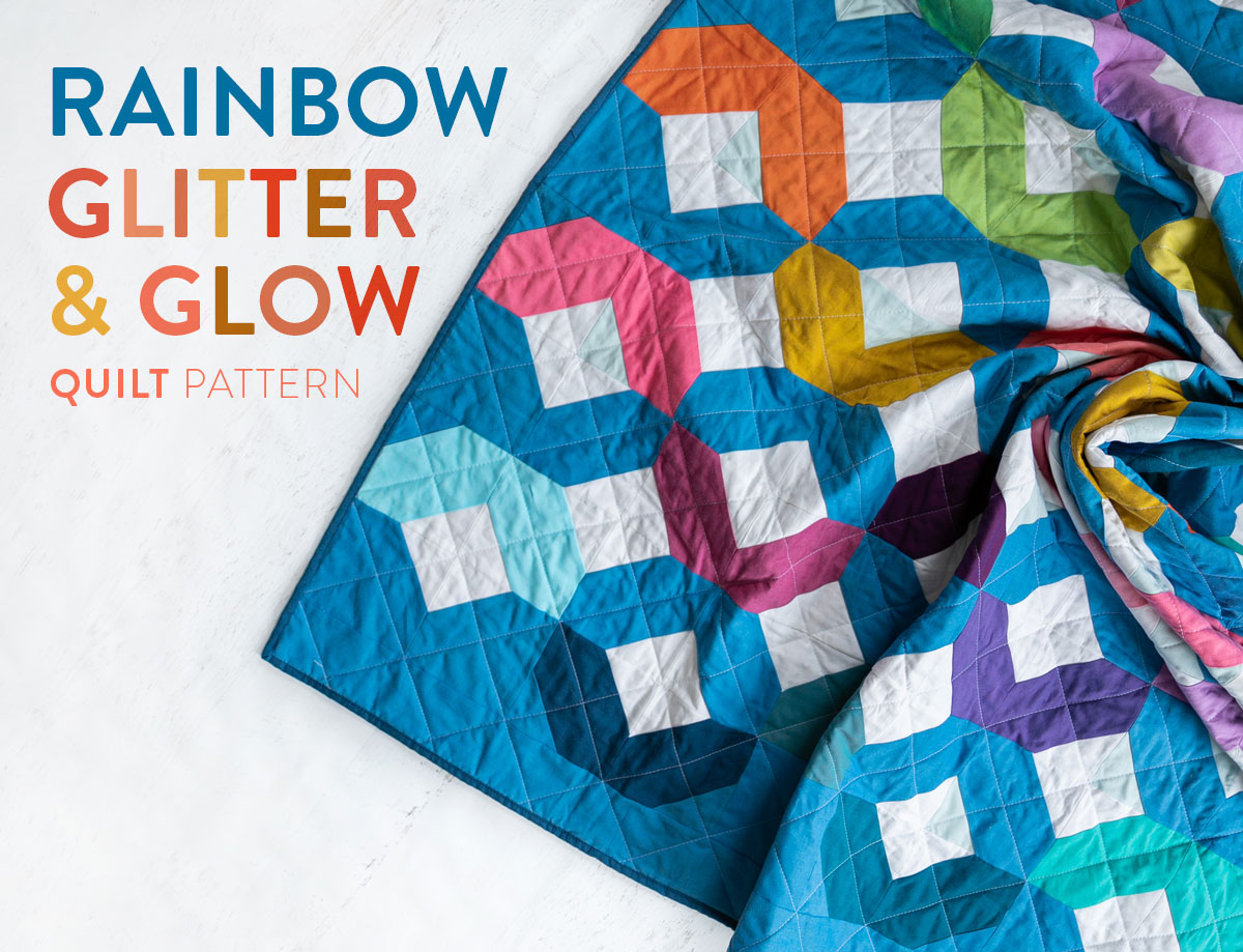 Make a Rainbow Quilt using this simple alteration to the Glitter & Glow quilt pattern. This is fat quarter friendly and great for newbie quilters and beginners. suzyquilts.com #rainbowquilt