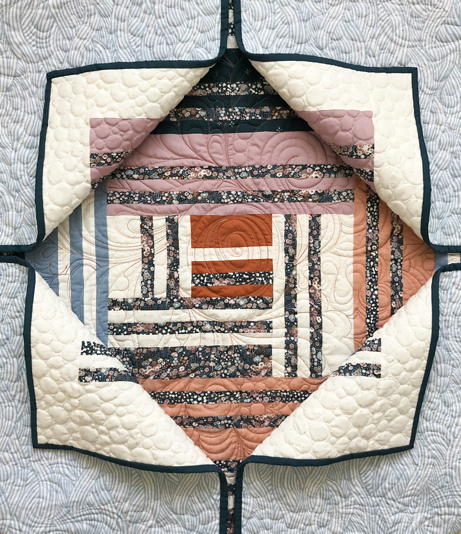 Grow is the first design in a series of four quilts that represent the four seasons in a year, as well as seasons in our lives. It includes fabric requirements and instructions for king, queen/full, twin, throw, and baby quilt sizes. This is an elegant modern medallion quilt. suzyquilts.com #modernquiltpattern