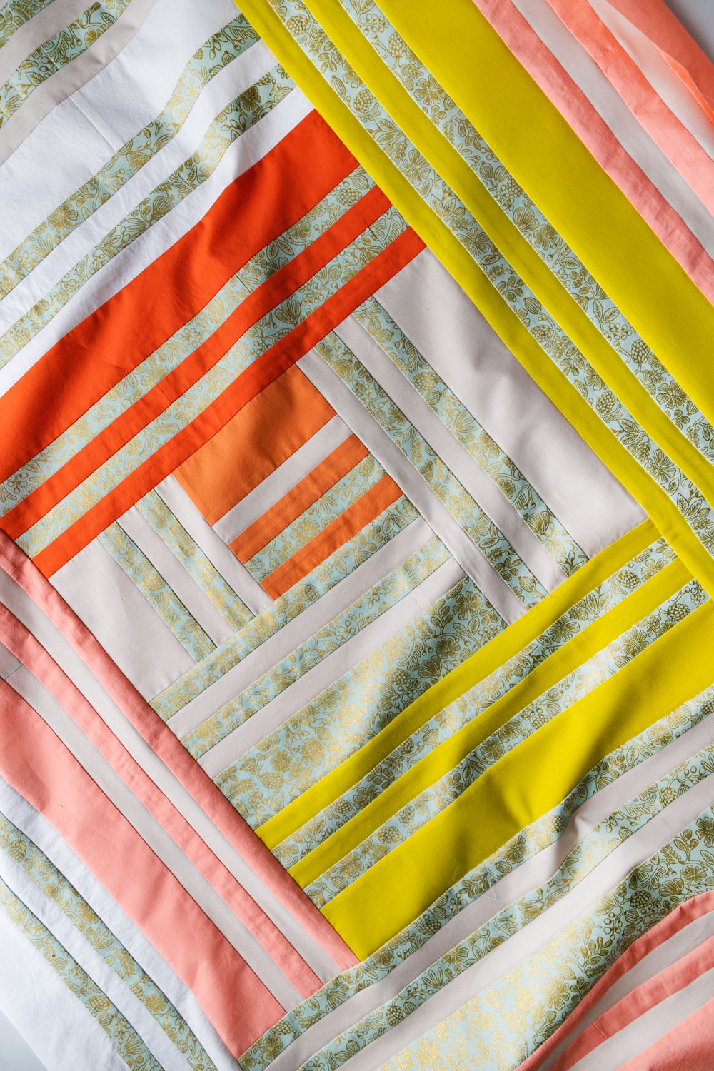 In Weeks 5 and 6 of the Grow quilt sew along we assemble the quilt top. Check out this video tutorial to show you how simple it is! suzyquilts.com #quilting #quiltpattern