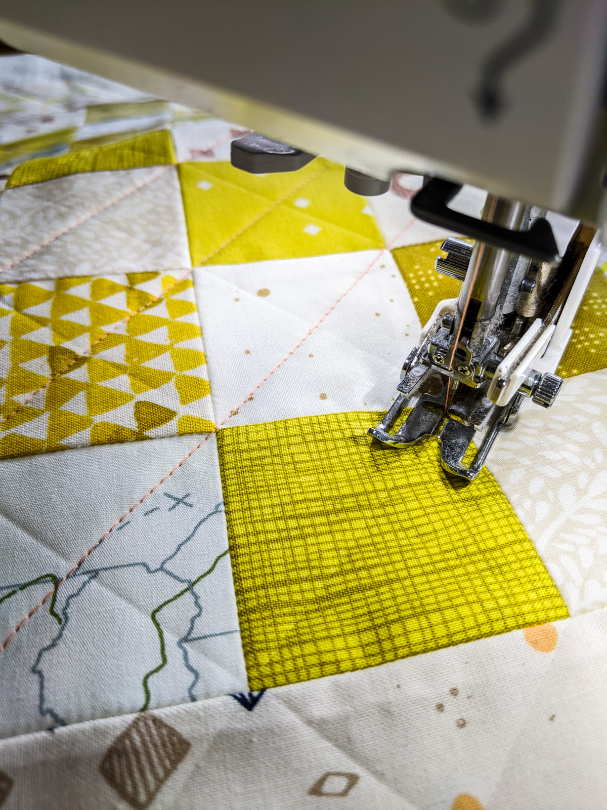 Learn all of the skills needed to make a quilt with this free DIY quilted checkerboard tutorial. A great sewing project for kids! suzyquilts.com #quilting #sewingtutorial