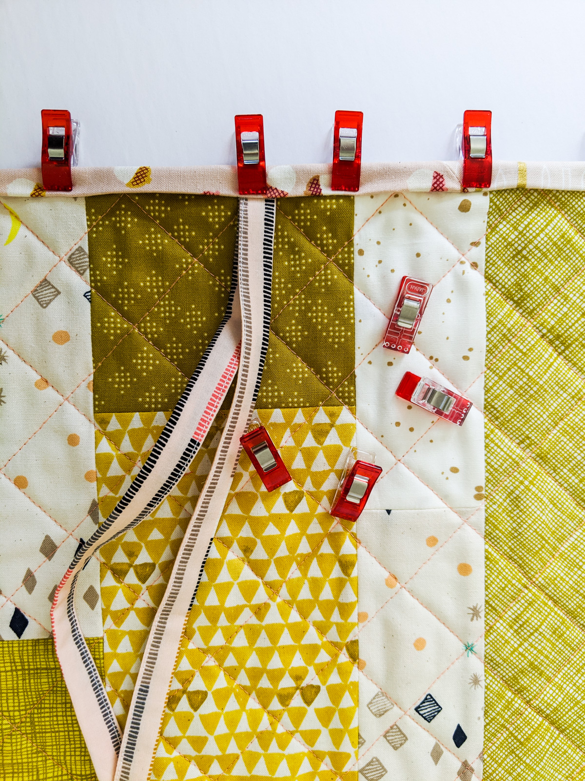This DIY Quilted Checkerboard is the perfect project for any beginner looking to learn the basics of quilting in a fun, easy project!