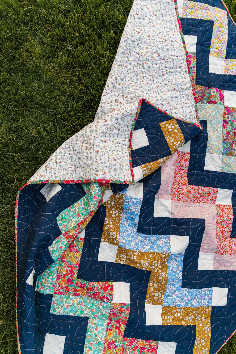 Thrive is a fat-quarter friendly modern quilt pattern using Liberty of London fabric. Get this Liberty of London quilt kit! suzyquilts.com
