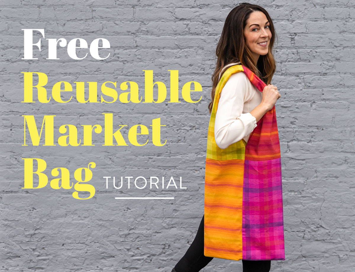 In this free reusable market bag tutorial you only need basic sewing skills and 4 fat quarters of fabric. This sewing DIY is great for kids too! suzyquilts.com #freebagpattern #beginnersewing #patchworkbag