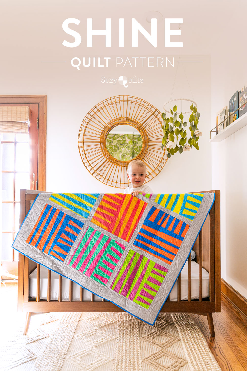 The Shine quilt sew along includes lots of added tips and videos to help you make this modern quilt pattern. This fat quarter quilt pattern is beginner friendly and focuses on improv sewing. suzyquilts.com #qal #quilting