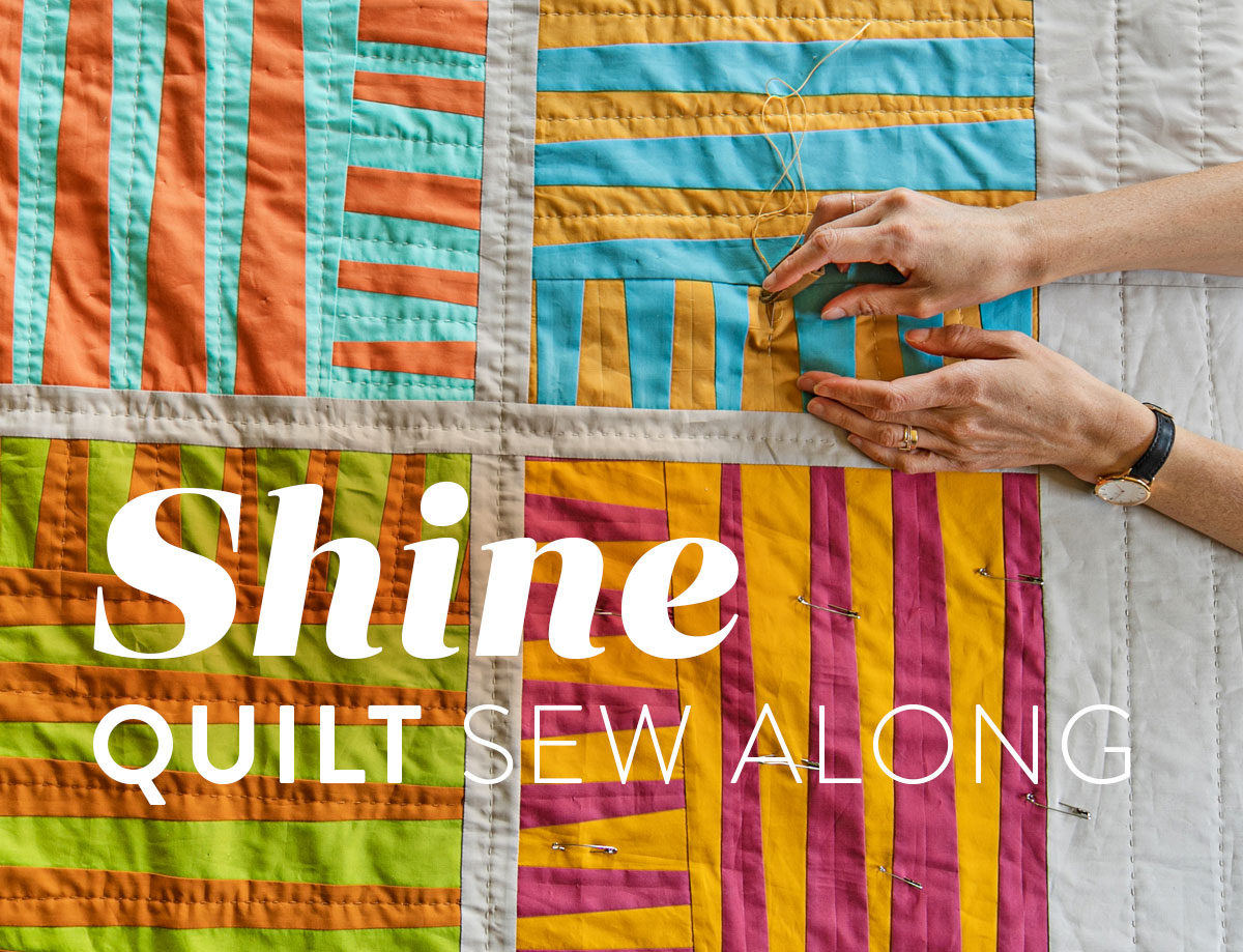 The Shine quilt sew along includes lots of added tips and videos to help you make this modern quilt pattern. This fat quarter quilt pattern is beginner friendly and focuses on improv sewing. suzyquilts.com #qal #quilting