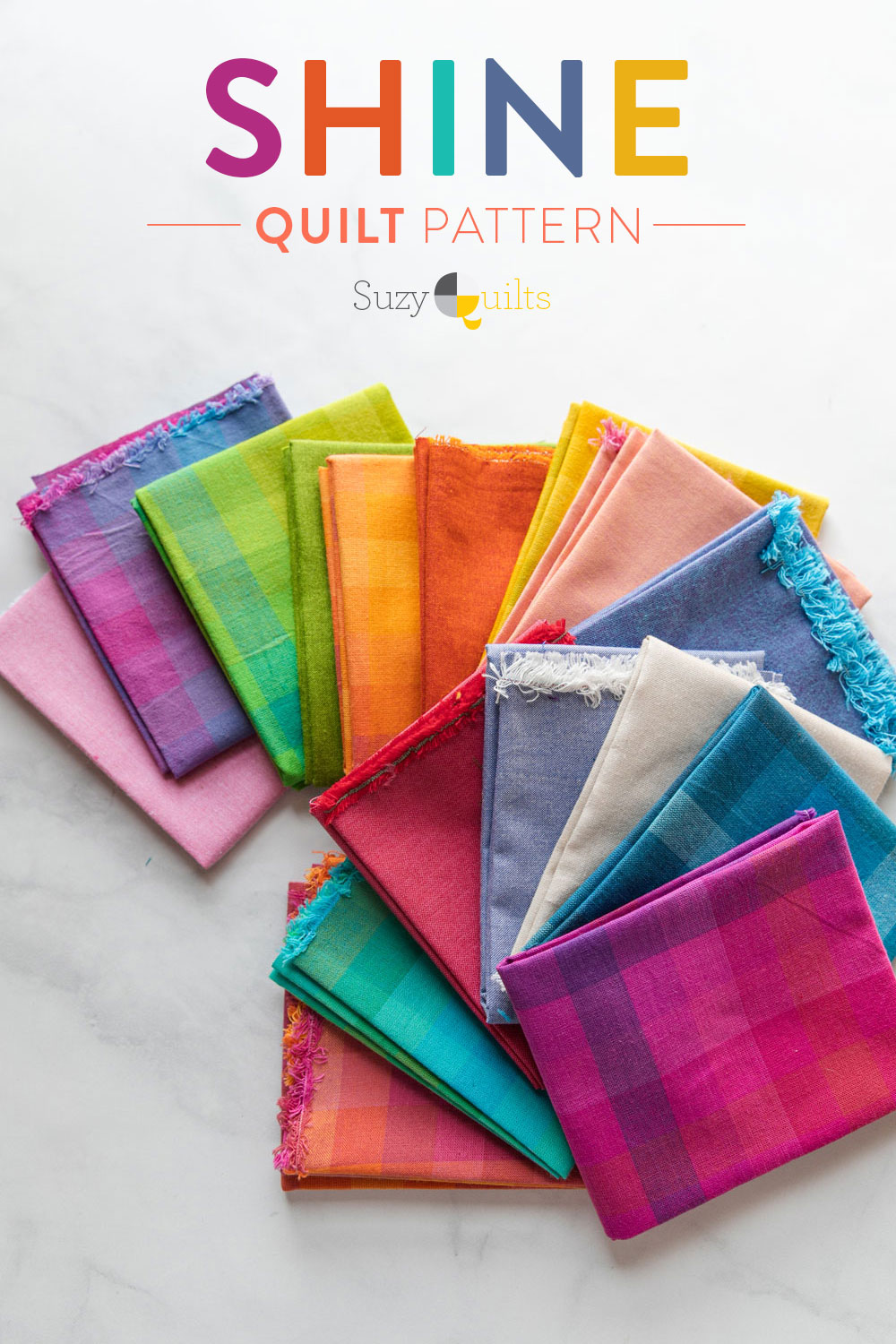 The Shine quilt sew along includes lots of added tips and videos to help you make this modern quilt pattern. This fat quarter quilt pattern is beginner friendly and focuses on improv sewing. suzyquilts.com #modernquilt #quiltfabric