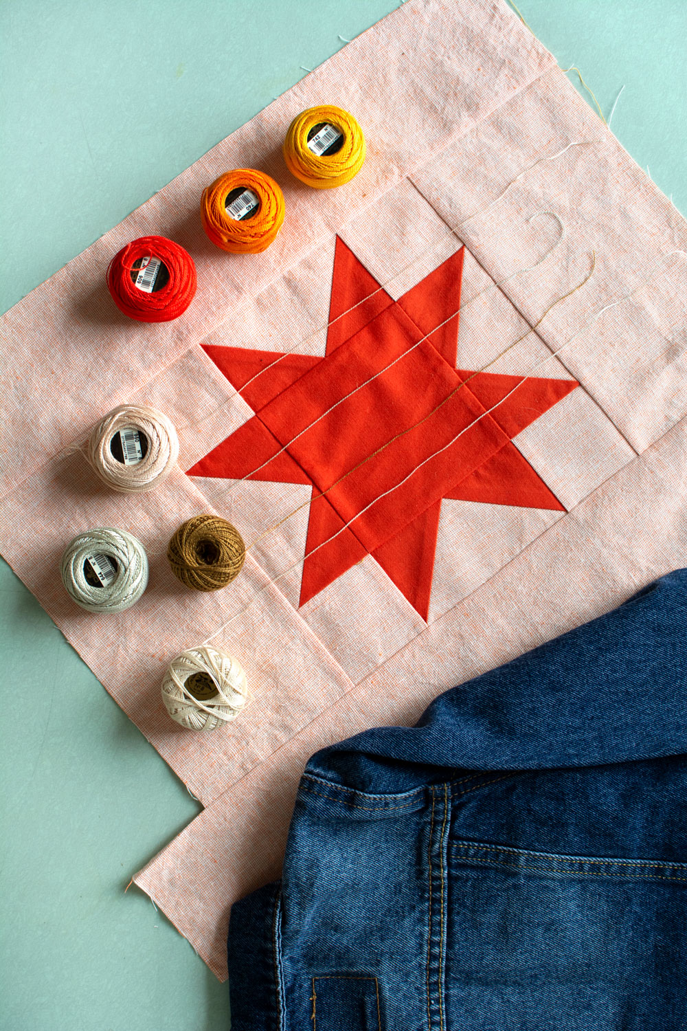 This simple patchwork jacket tutorial is the perfect way to breathe new life into old clothes. Upcycle denim or old clothing to make quilted clothing! suzyquilts.com #upcycleclothes #jackettutorial