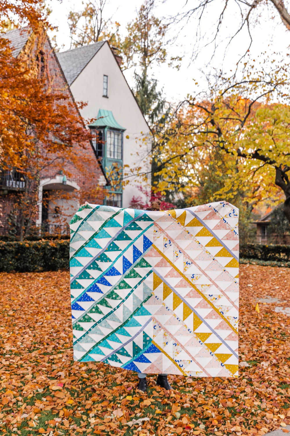 Gather is an HST modern quilt pattern with a unique twist! This instant PDF download comes in queen, twin, throw and baby quilt sizes. suzyquilts.com #quilthst