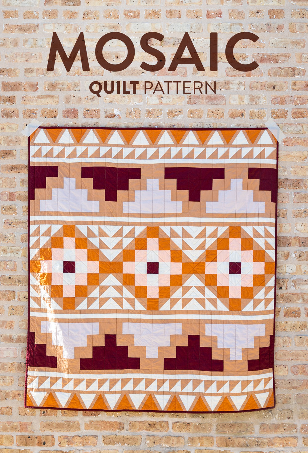 Be inspired by colors of the desert and make your own Mosaic quilt. With warm solid fabrics, this quilt pattern looks modern and timeless! suzyquilts.com #quiltkit #quiltpattern