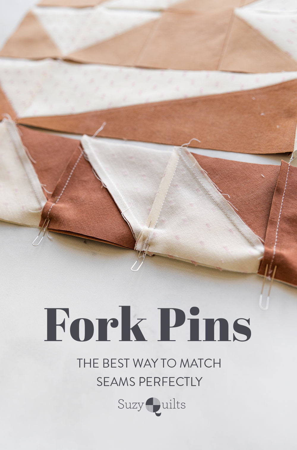 Quilting with fork pins is the best way to match seams perfectly! Line up all of your quilt blocks and nest seams with these pins. suzyquilts.com #quilting #sewingtools