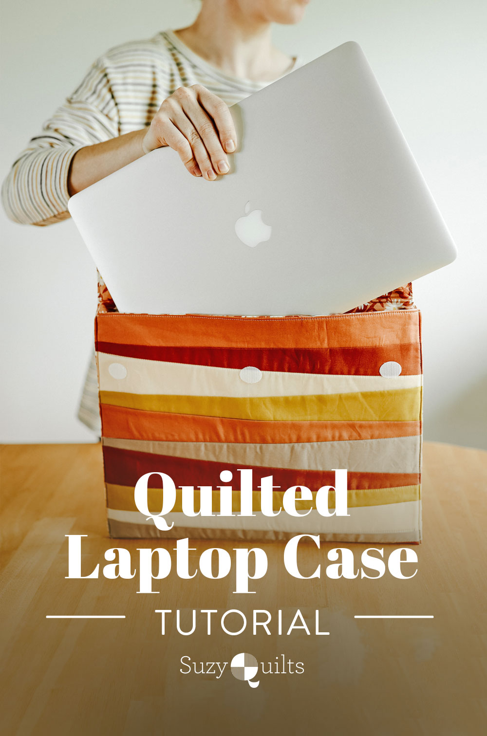 Learn to sew a beginner-friendly quilted laptop case in this tutorial featuring the Shine quilt block by Suzy Quilts. suzyquilts.com #sewingdiy #quilting
