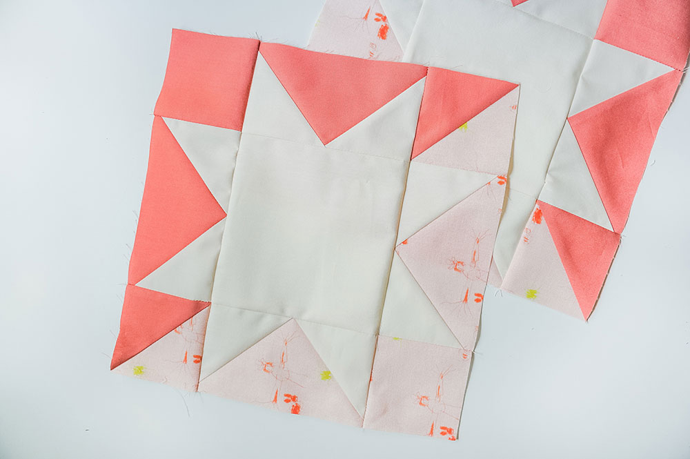 This DIY tutorial explains how to print your child's art onto fabric to make a beautiful memory quilt using kids' artwork! suzyquilts.com #sewingtutorial #quilting