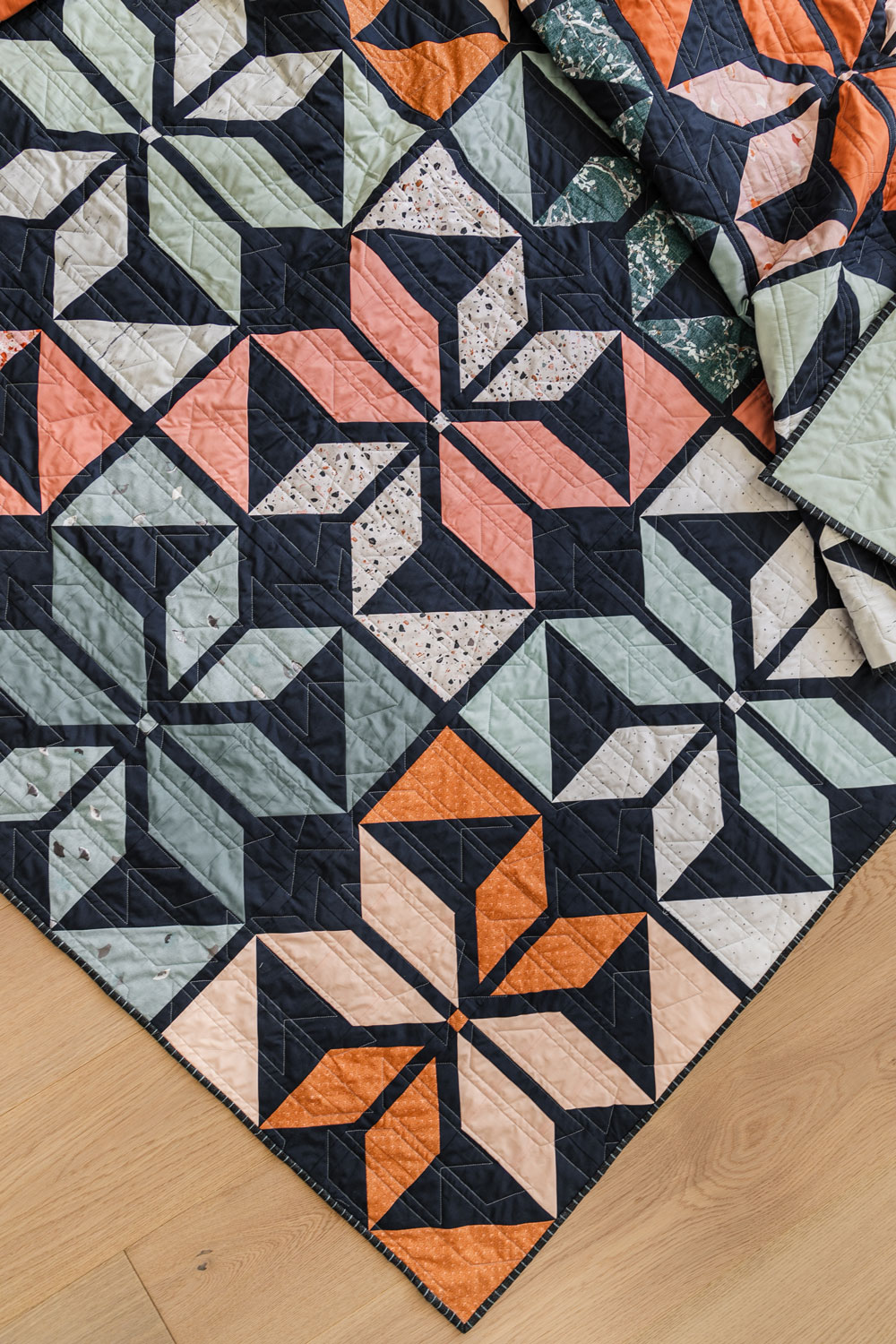 Week 6 is the final week of the Holiday Party quilt sew along! This week we assemble the quilt blocks and finish the top. suzyquilts.com #quiltalong #modernquilt