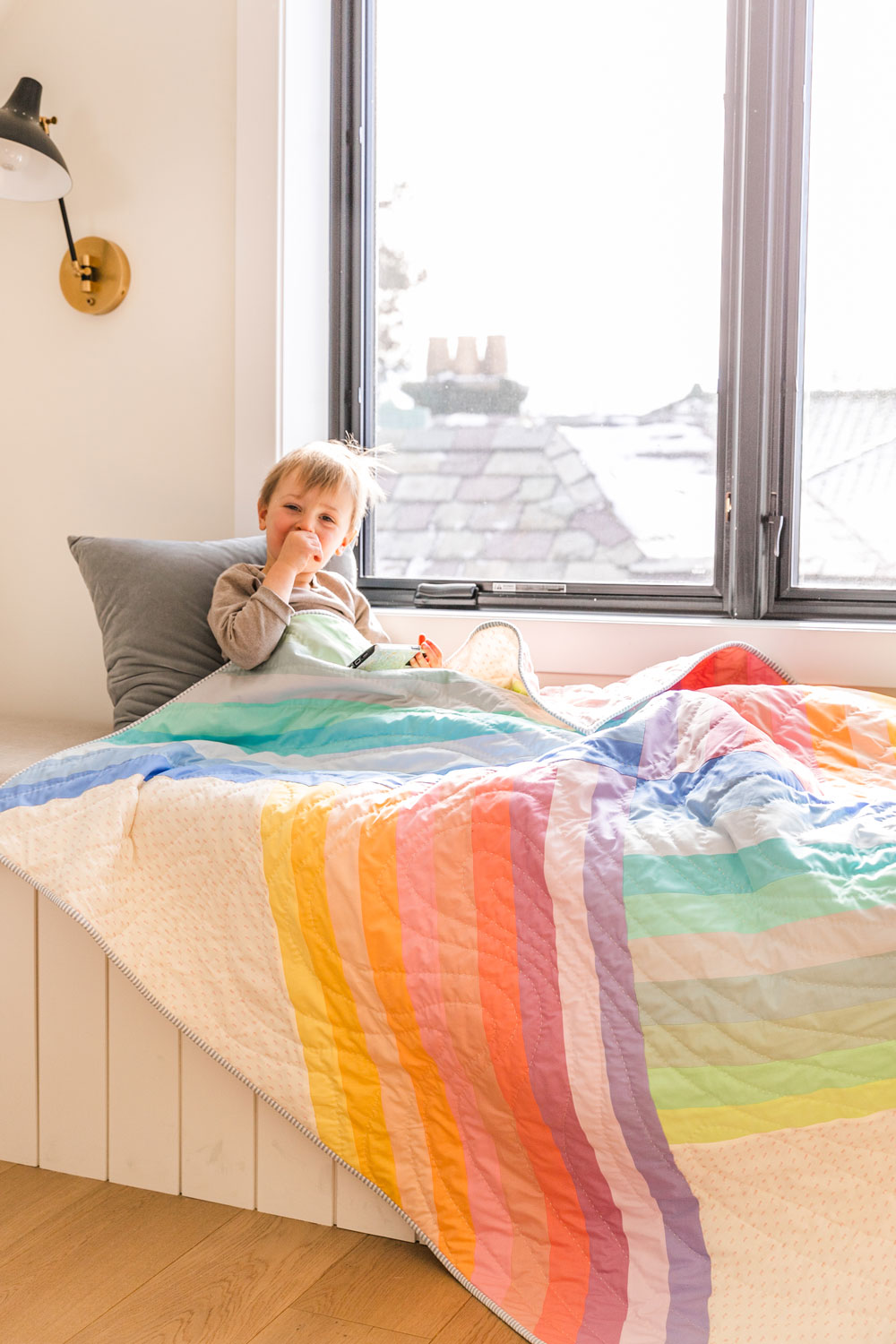 Adventureland is a beautiful modern quilt pattern. It's jelly roll friendly and perfect for beginner quilters or those learning to sew. suzyquilts.com #modernquilt #babygirl