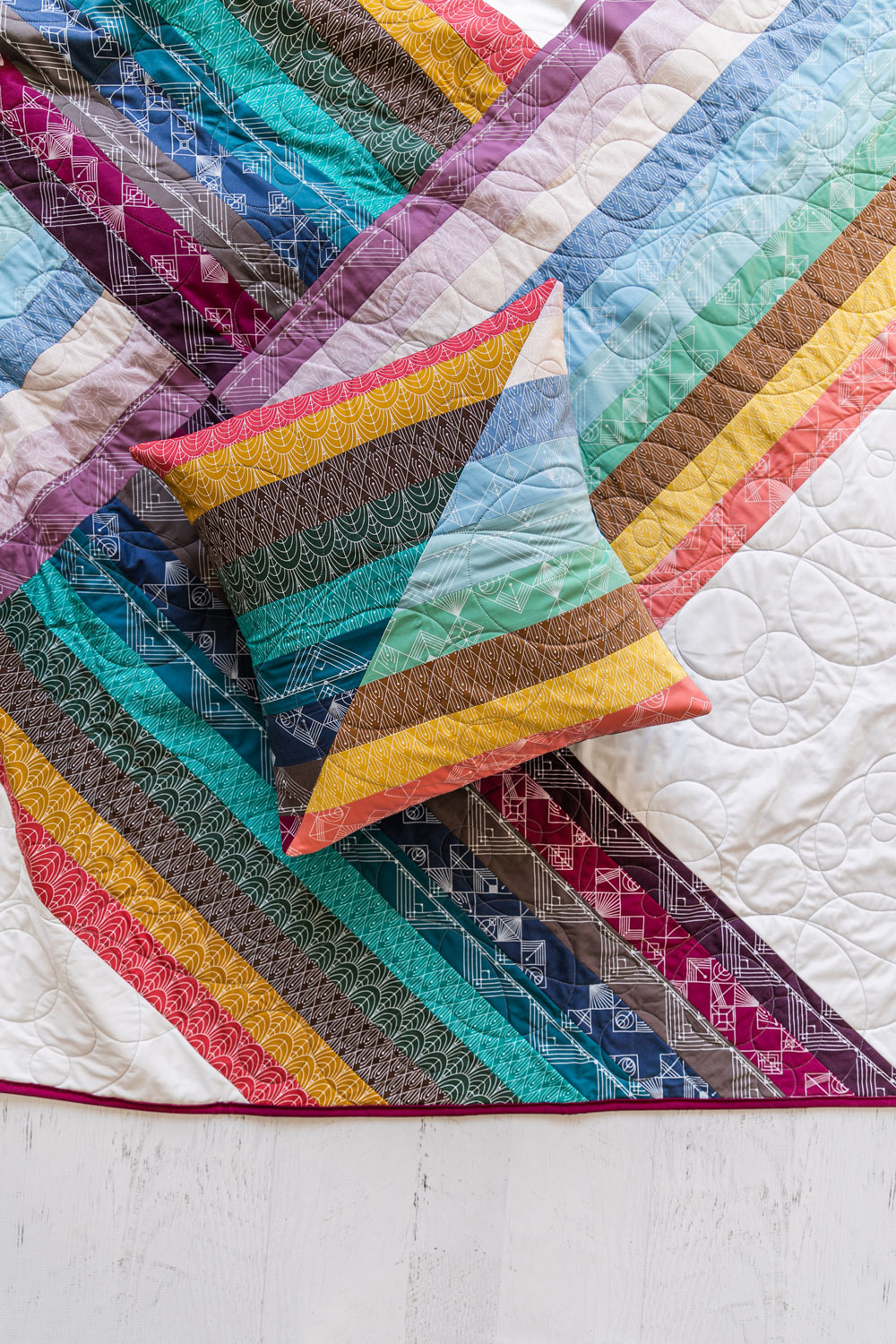 The Adventureland quilt along includes extra tips and inspiration to make this beginner and jelly roll friendly quilt pattern. suzyquilts.com #jellyrollpattern