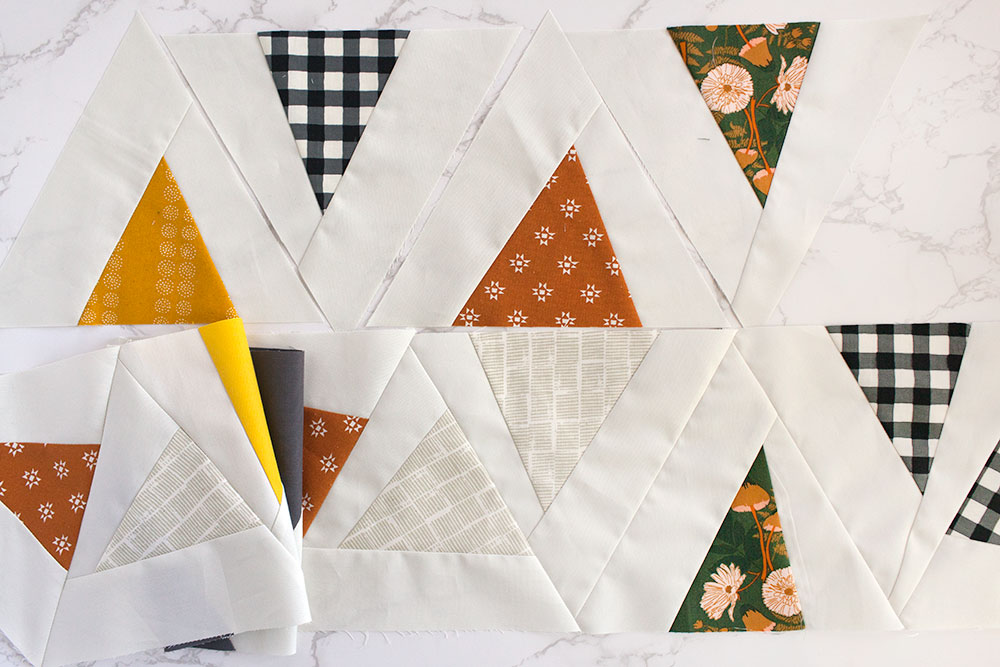 The Perennial quilt sew along will help you make this beautiful modern quilt through added instructions, pictures and tips! suzyquilts.com