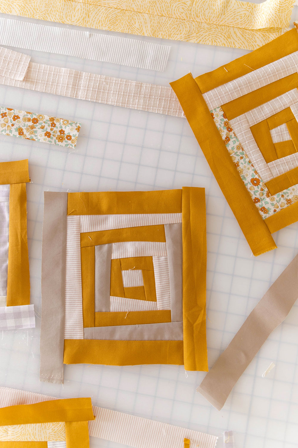 In Weeks 3 and 4 of the Shining Star quilt sew along we make the center units—improv log cabins. They are so cute and fun! Join me!! suzyquilts.com