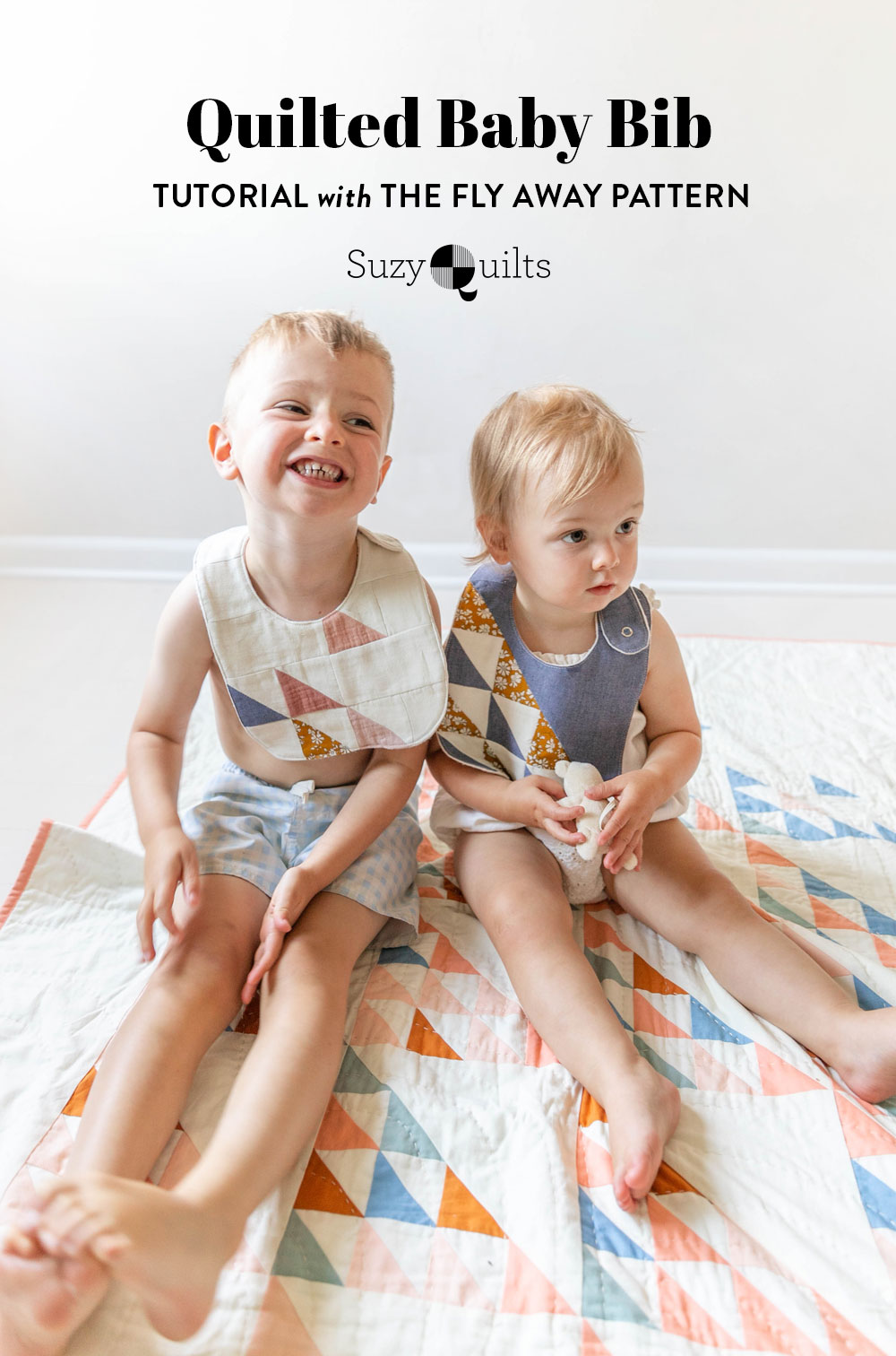 This fast and simple quilted baby bib tutorial uses the Fly Away pattern and fabric scraps to make something beautiful! suzyquilts.com #babybib #sewingtutorial