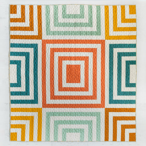 Fireside is a modern beginner-friendly quilt pattern that includes queen/full, twin, throw and baby quilt sizes along with instructions and fabric requirements for multiple color variations