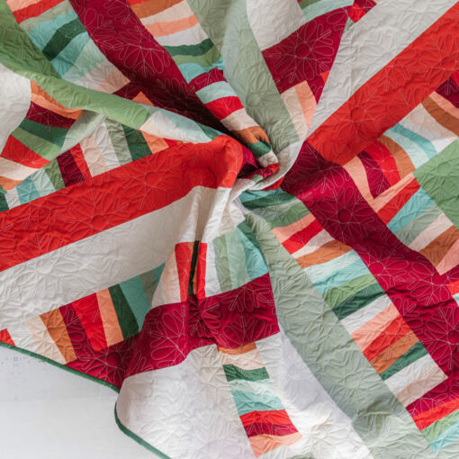 The Garland Quilt pattern is beginner-friendly, scrap-friendly and precut-friendly! This is the perfect quilt pattern for small scraps of fabric or leftover precut bundles. Sizes include Throw, Baby and Wall Hanging. suzyquilts.com