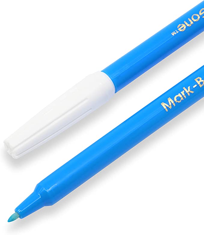 5 Minute Guide to Quilt Marking Tools: A blue water-soluble pen that is open next to one that has a white lid. #quilting #sewingdiy suzyquilts.com 