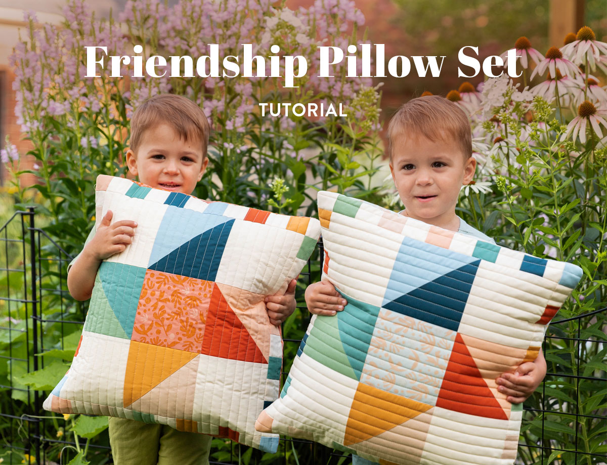Friendship Pillow Set: Matching pillow set made using a modern spin on the friendship star quilt block. #TheCuttingTable suzyquilts.com