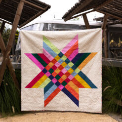 Star Crossed 2.0 Quilt Pattern: Star Crossed 2.0 quilt in rainbow colors. #quilting suzyquilts.com