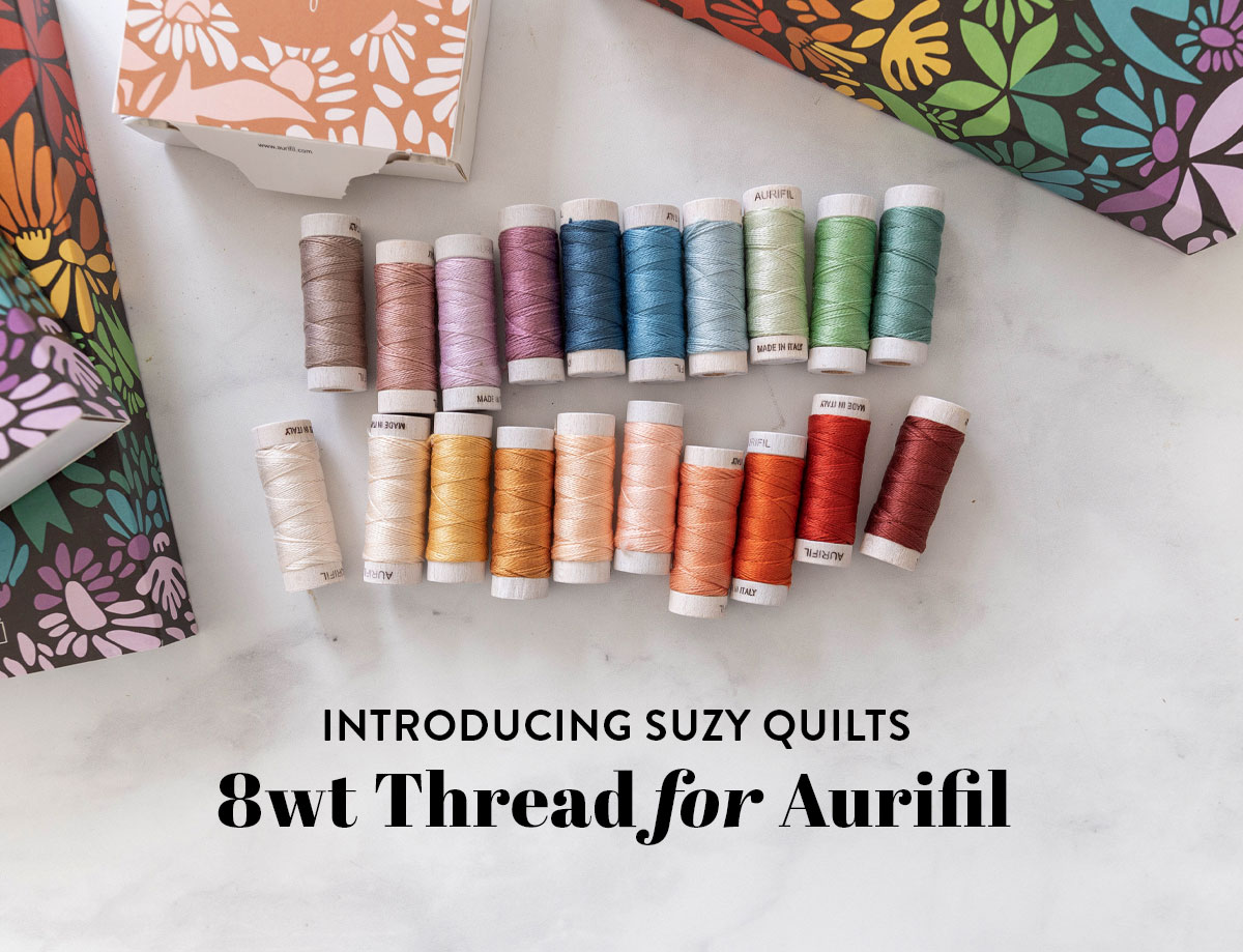 The new Evolve 8wt thread by Suzy Quilts for Aurifil is perfect for your next hand quilting project! suzyquilts.com