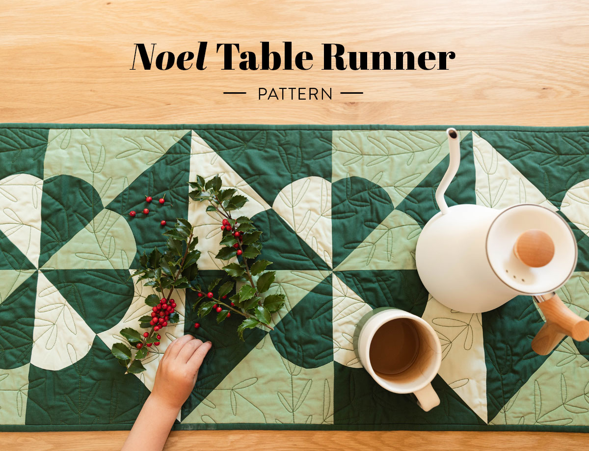 Noel Quilted Table Runner Tutorial at suzyquilts.com