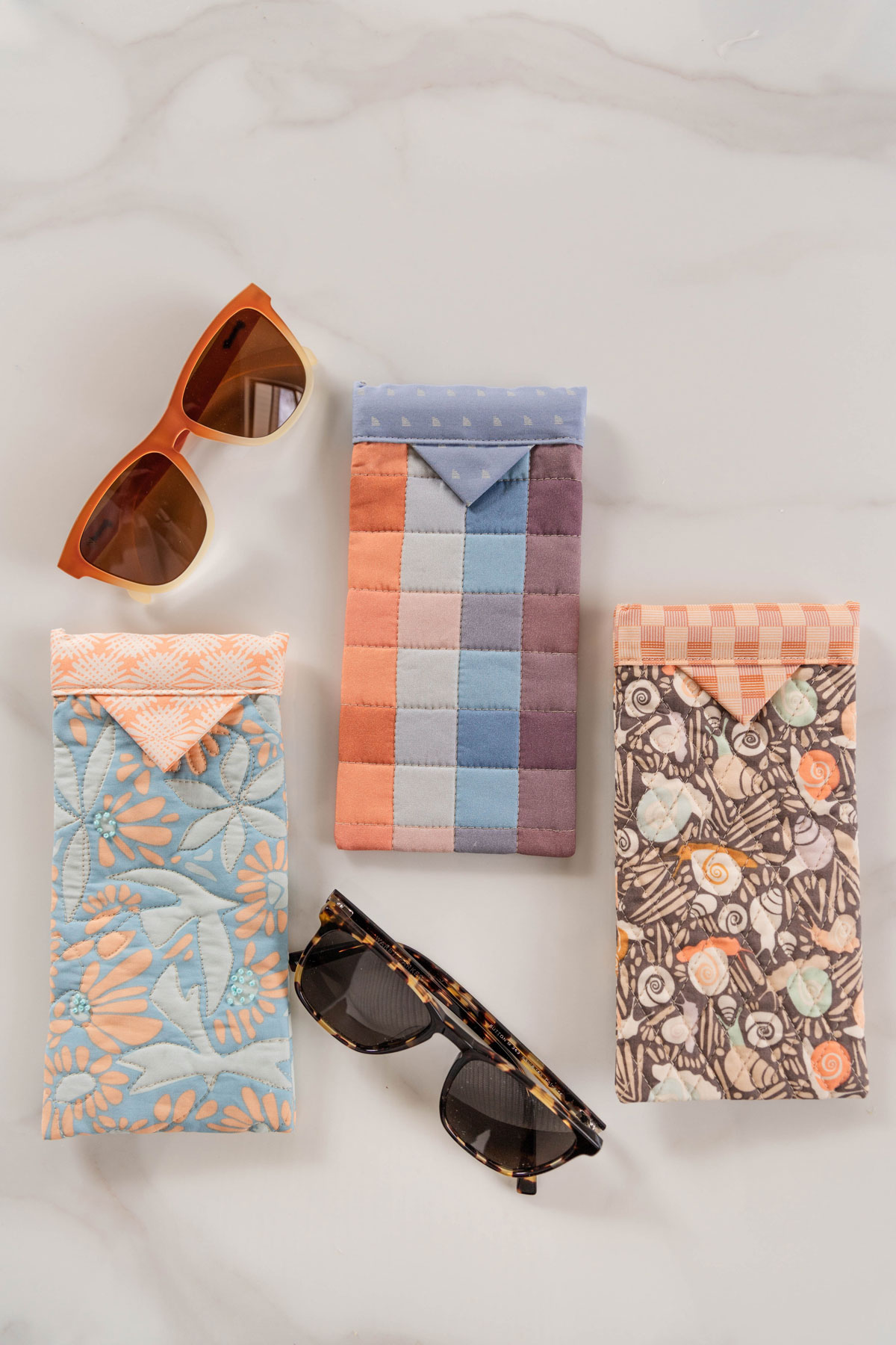 Handmade sunglasses cases and sunglasses. #quilting #sewingdiy suzyquilts.com Handmade sunglasses cases and sunglasses. #quilting #sewingdiy suzyquilts.com