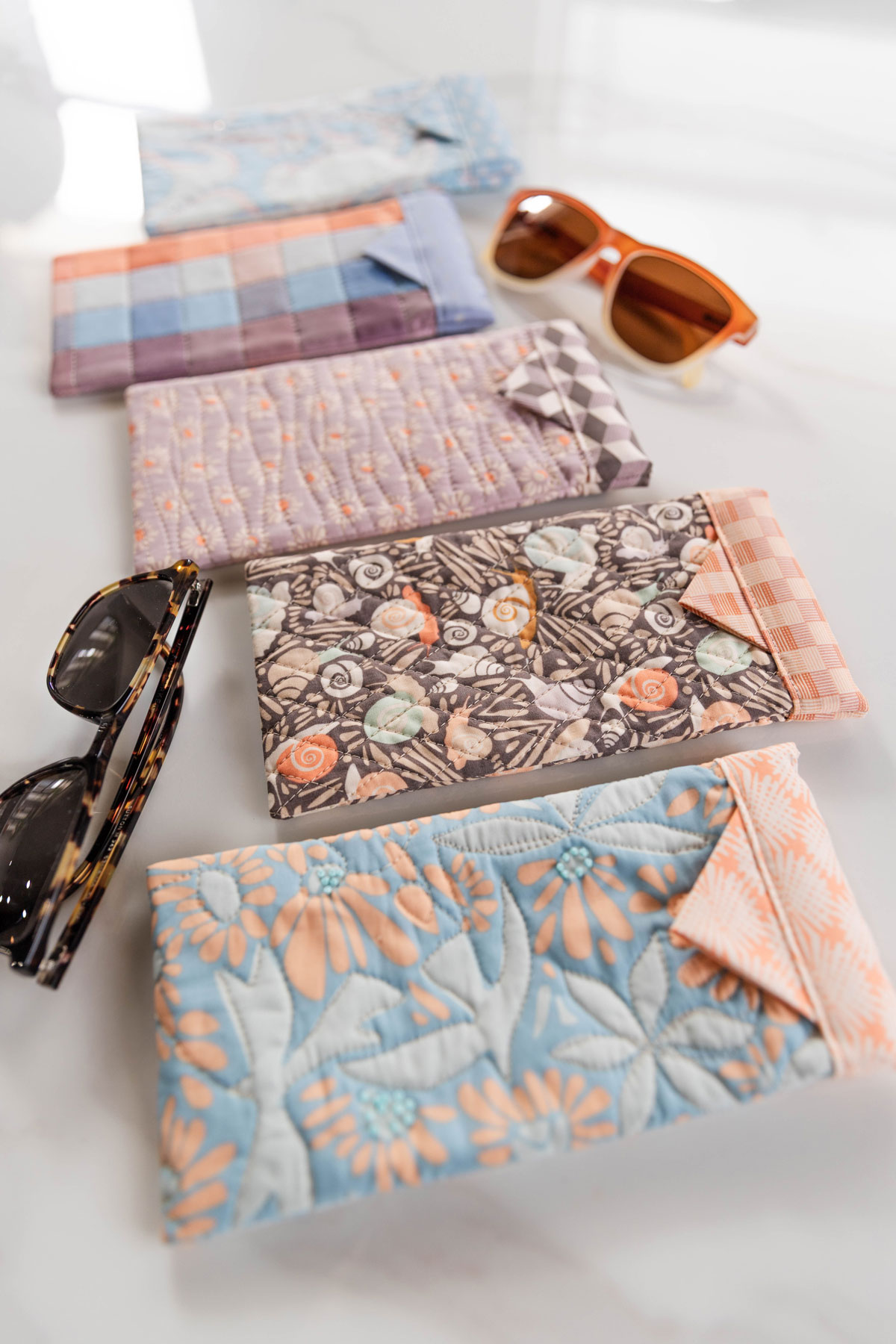 Handmade sunglasses cases and sunglasses. #quilting #sewingdiy suzyquilts.com Handmade sunglasses cases and sunglasses. #quilting #sewingdiy suzyquilts.com