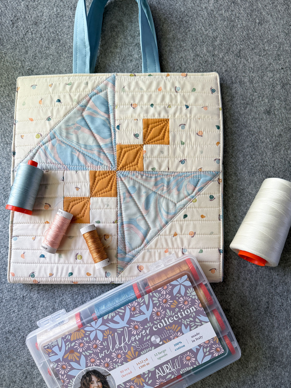 A child's art folio made using Slow Summer fabric and the Dragonfly Lake quilt blocks. #quilting #sewingdiy suzyquilts.com A child's art folio made using Slow Summer fabric and the Dragonfly Lake quilt blocks. #quilting #sewingdiy suzyquilts.com