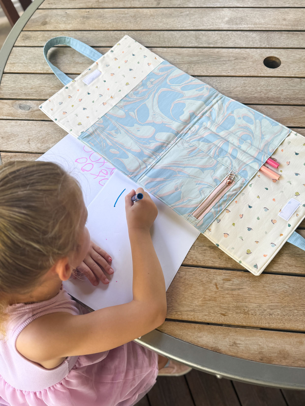 A child's art folio made using Slow Summer fabric and the Dragonfly Lake quilt blocks. #quilting #sewingdiy suzyquilts.com A child's art folio made using Slow Summer fabric and the Dragonfly Lake quilt blocks. #quilting #sewingdiy suzyquilts.com