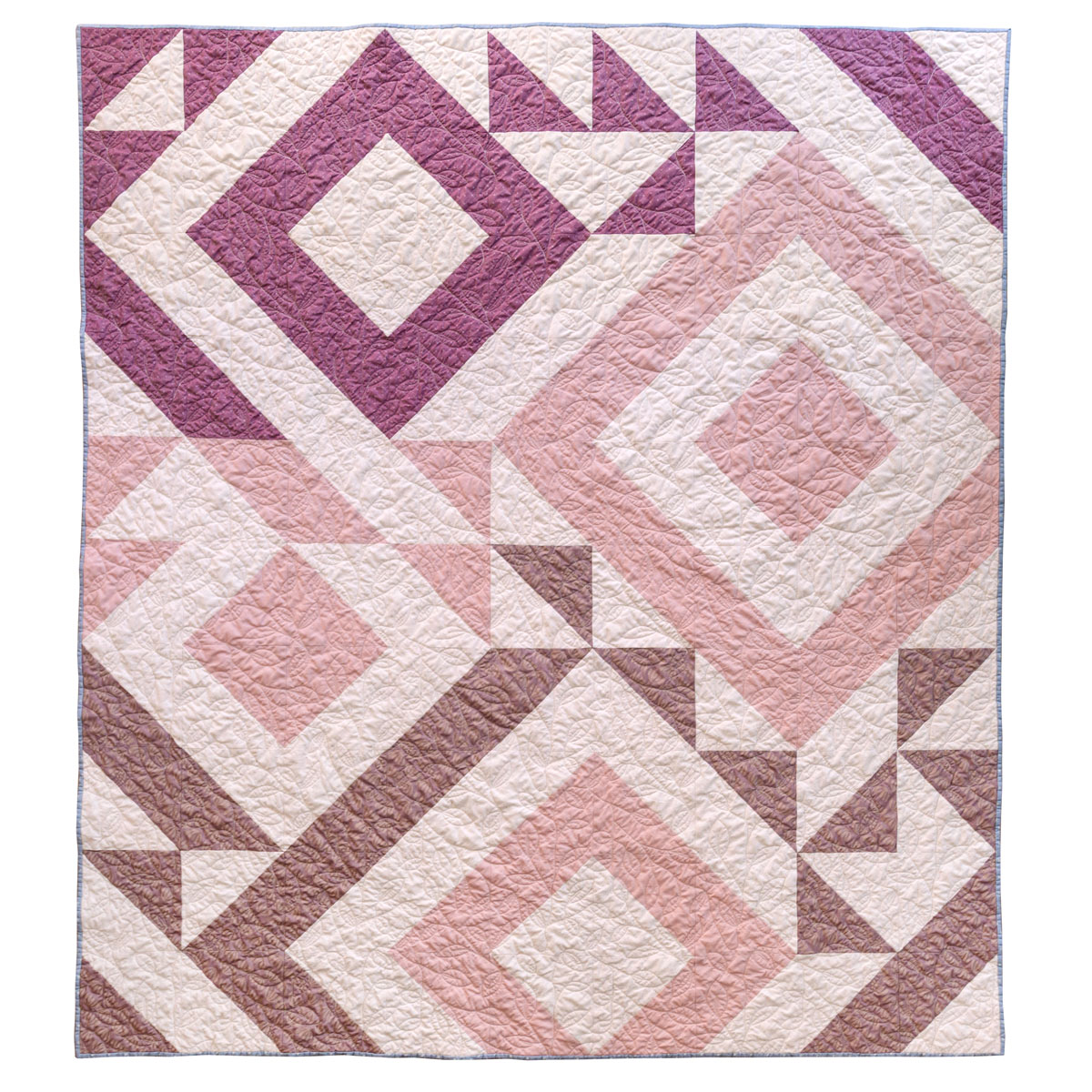 A Triangle Jitters quilt made using fabric from the Suzy Quilts Wildflower Wovens and Slow Summer collections. #Quilting #SewingDIY suzyquilts.com A Triangle Jitters quilt made using fabric from the Suzy Quilts Wildflower Wovens and Slow Summer collections. #Quilting #SewingDIY suzyquilts.com